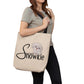 The Snowkie Tote Bag with Woman Holding the Bag